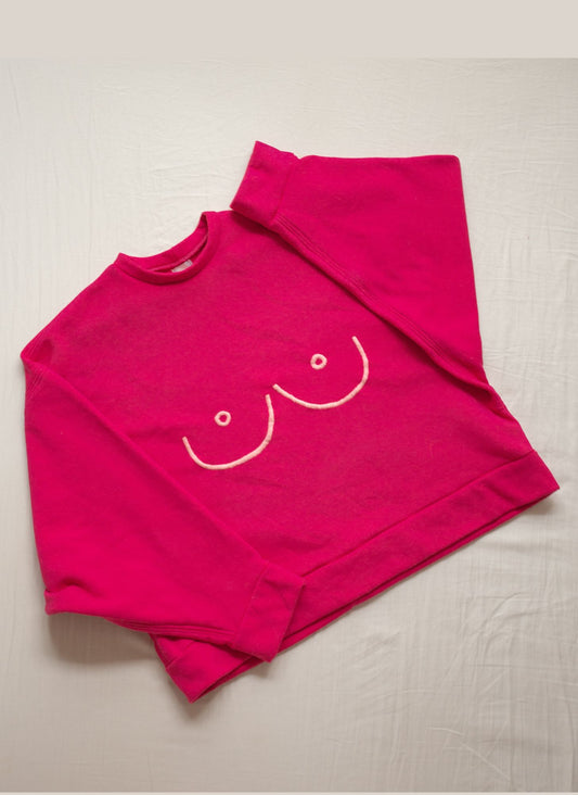 Embroidered sweatshirt with breast-shaped motifs