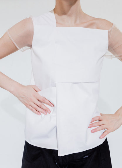 Asymmetric top with origami pattern